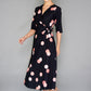 BLACK AND PEACH POLKA DOT WRAP TIE DRESS