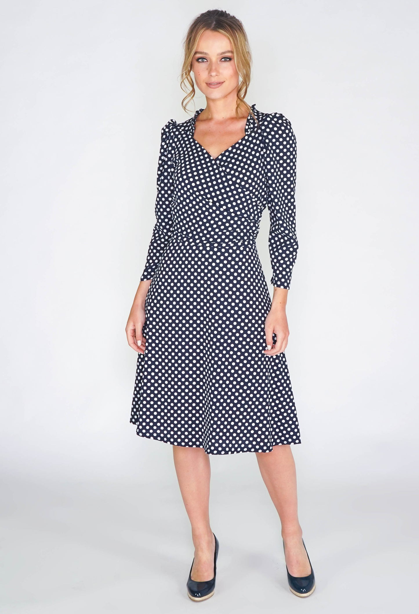 navy dress in polka dot print