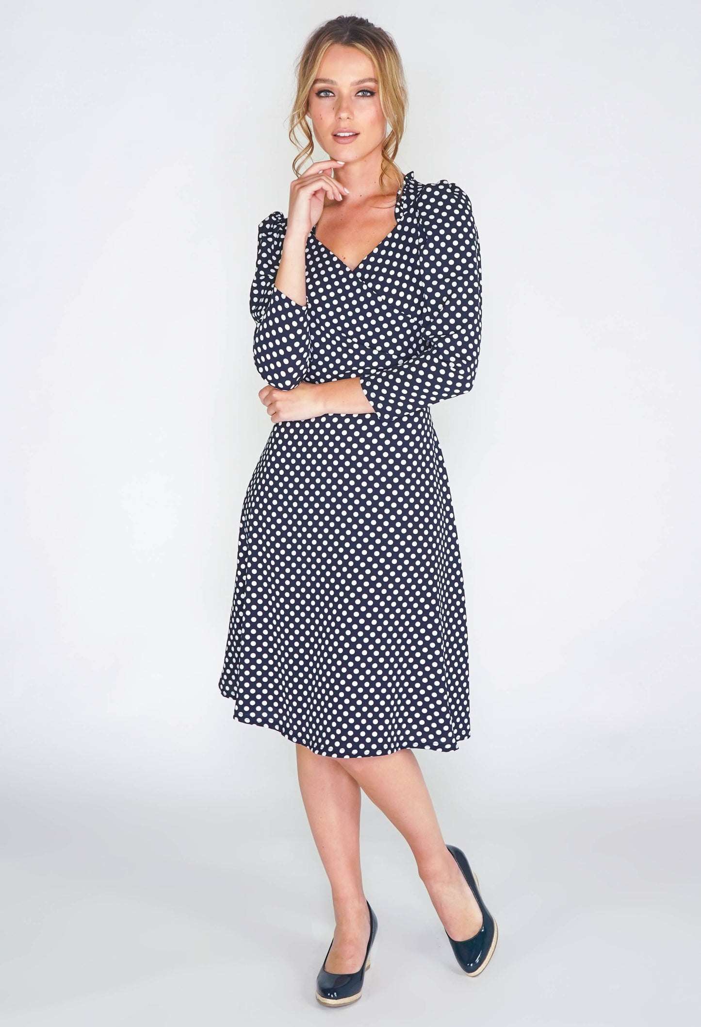 navy dress in polka dot print