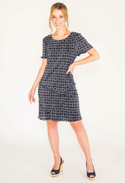 NAVY PRINT CIRCLE DRESS WITH ASYMMETRICAL PANELS