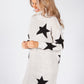 Beige Knit Tunic with Black Star Design