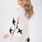 Beige Knit Tunic with Black Star Design