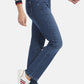 5-POCKET JEANS "NORMA" WITH METAL APPLICATIONS IN BLUE DENIM