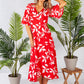 wrap dress in red with a leaf print design