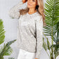 Long Sleeve Knit in a Light Grey Palm Print