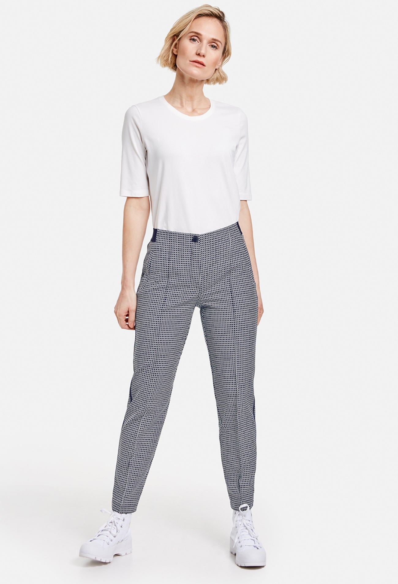 Trousers with a mini check pattern