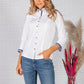 WHITE SHIRT WITH BLUE PRINT TRIM