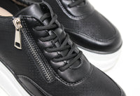 Black double sole trainer