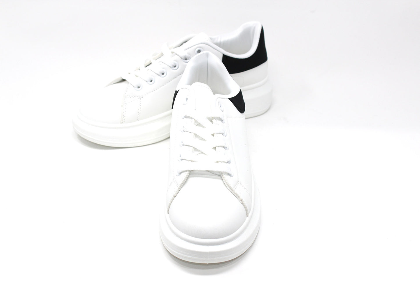 Lace Up Trainer In White with Black Heel