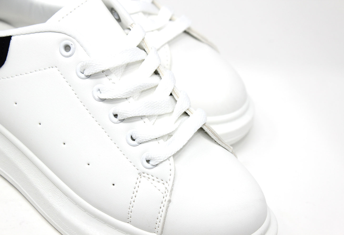 Lace Up Trainer In White with Black Heel