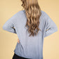 V-NECK LONG SLEEVE KNIT TOP IN NAVY