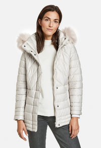 QUILTED JACKET WITH A FAUX FUR HOOD