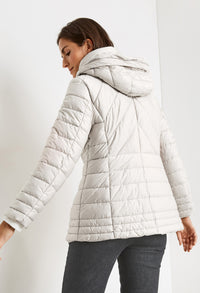 QUILTED JACKET WITH A FAUX FUR HOOD