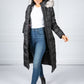 Long Quilted Down Feather Coat with Faux Fur Hood in Black